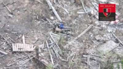 Russian soldier put grenade under himself and tried to perform perfidy by  fake-surrendering to ukrainian soldiers, but his actions were spotted with UAV and he was eliminated on the spot.