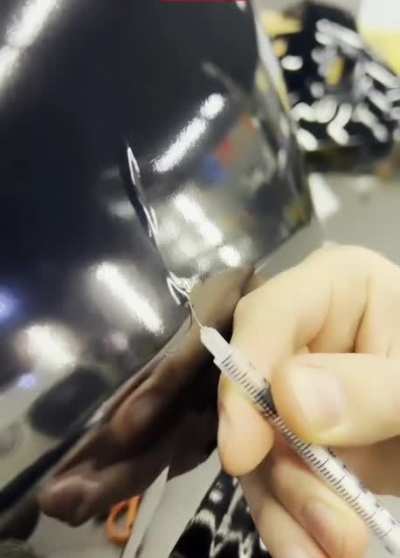 Removing air bubble from under the wrap