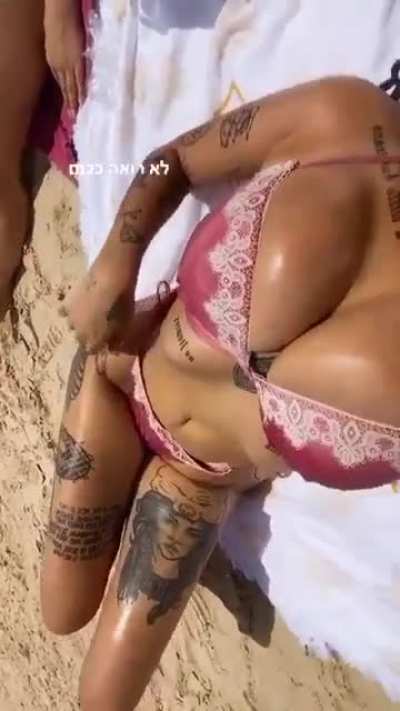 Tattooed Tanning Tits
