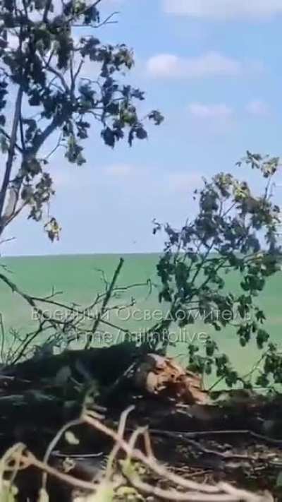 Ukrainian soldiers film 2 Russian helicopters, engage them with small arms, and receive a rocket salvo in response. Unknown location, May - June 2022.