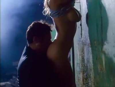 Pamela Anderson sex up against a wall in &ldquo;Raw Justice&rdquo;