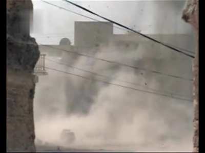 IED explosion destroyed American Humvee in Iraq. Date unknown