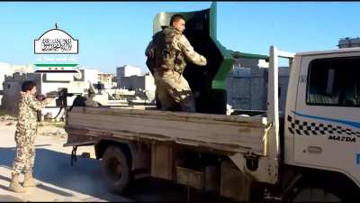 FSA using a cannibalized BMP-1 73mm 2A28 "Grom" mounted on a Mazda flatbed - Aleppo - 3/19/2013