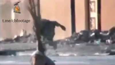 Armour plate saves a US soldier after getting hit by a sniper in the back (Iraq unknown date)