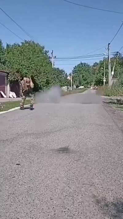 Car tire vs Ukrainian butterfly mines in a Donetsk suburb.