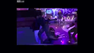 Woman hits man and he drags her by hair during the recording of a Russian TV program