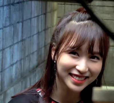 Embarrassed Mina gummy smile