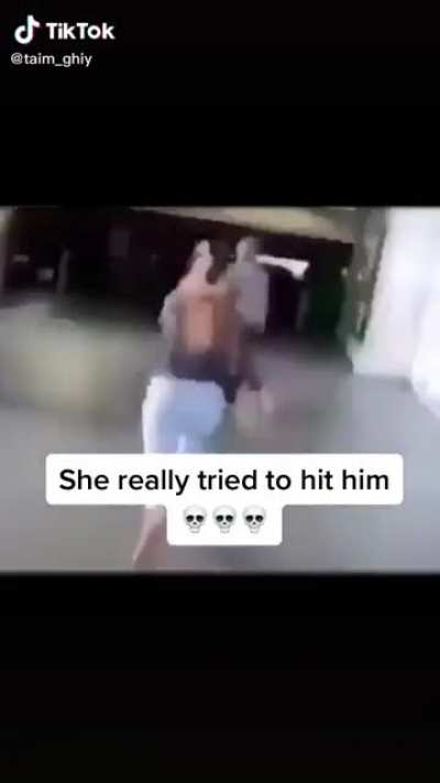 Girl tries to jump a guy but gets wrecked