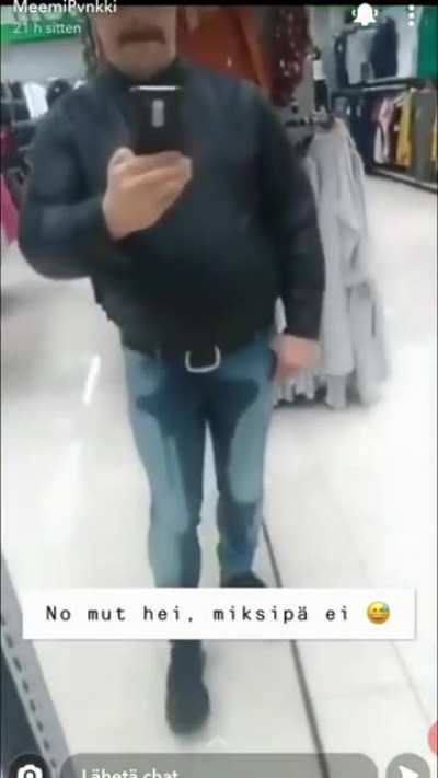 Guy urinates himself in a store