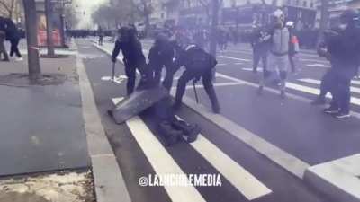 French Riot police officer knocked out by a projectile