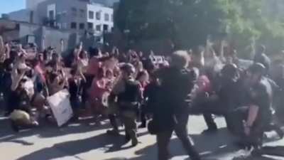 National Guard and Police kneel with Protestors in Omaha, NE