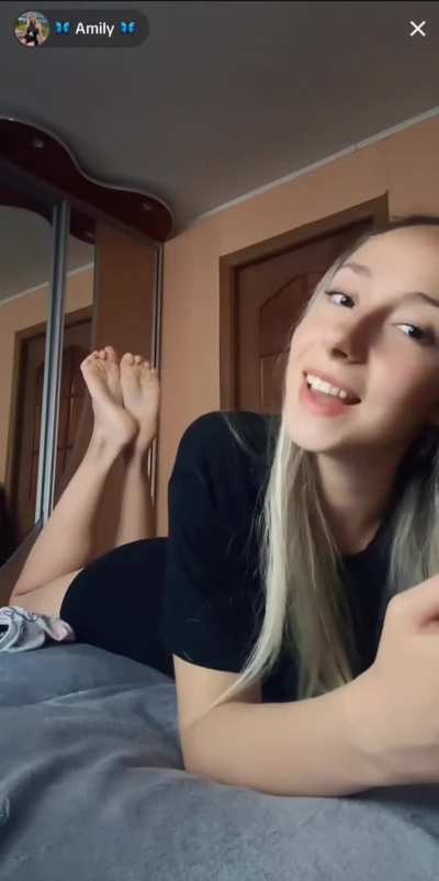 Amily takes her socks off