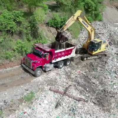 The Ocean Cleanup scooping literal truckloads of plastic out of the Rio Las Vacas river