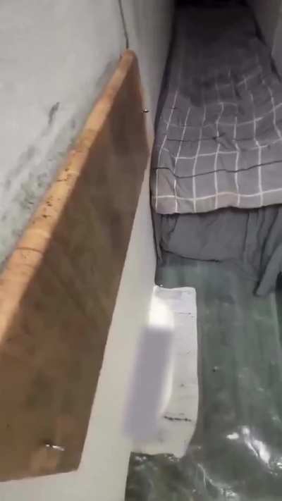 In China, 40 cm-wide &ldquo;mini-end&rdquo; units are rented for just one dollar, offering only a tiny bed, a power outlet, and a wall-mounted TV.