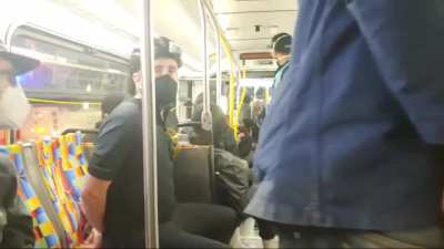 Dude films the inside of a bus full of rioters in plastic handcuffs including himself who were taken in by police and brought to a building with a bunch of other rioters in Los Angeles