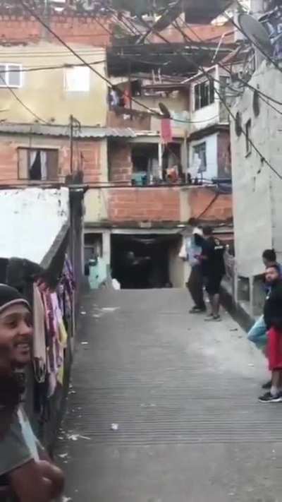 Just a shooting down the street of the favela, there's nothing to see here
