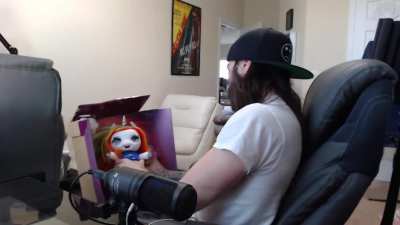 Charlie opening a poopsie unicorn