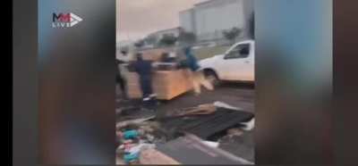 Looting in Durban and Johannesburg, South Africa, covered under name of protesting. Multiple malls and stores being emptied and burnt to ashes with minimal arrests (just over 200) and little to no police visibility. (Credit Times Live FB)