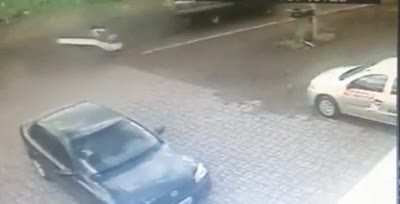 WTF moment. Cyclist hit by car and saved by mattress thrown off the car.