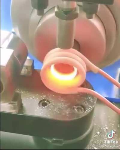 Using induction heating for tube forming