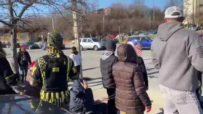 After purposely shoving an old conservative woman to the ground, the violent anti-Trump protestor returns and throws punches at a passive group of conservative Proud Boys who want him to stop instigating