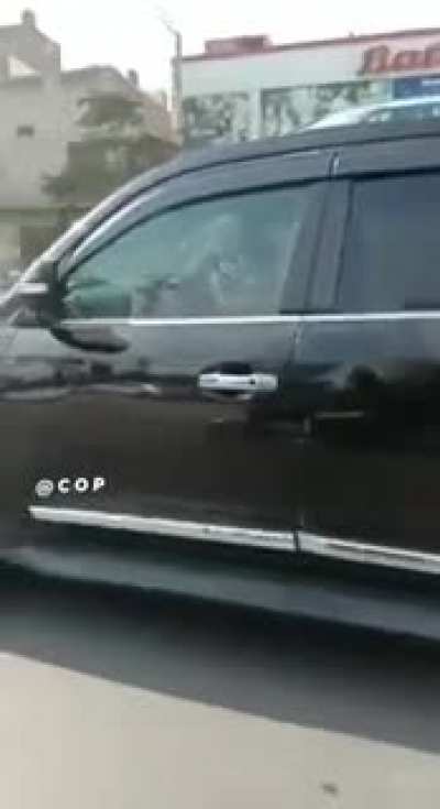 Kid casually driving a landcruiser in Multan