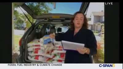 Congresswoman Porter schooling Big Oil with her visual aid.