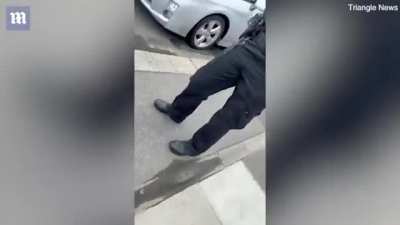 Man in Britain draped his car in a Palestinian flag while waiting to pick up his sister from school. Zionist Karen shows up, harasses him, and calls the cops. Ten cops arrive in six cars to fine him for causing her and other parents "distress"