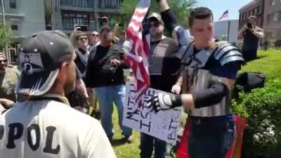 Based American Patriot Punches a Confederate Traitor In The Mouth