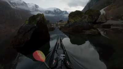 What it looks like when you are on the water between the mountains of a Norwegian fjord