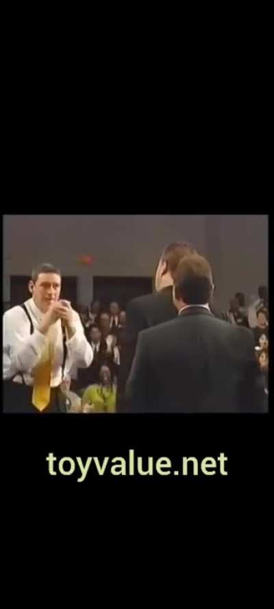 this is hilarious, is the pastor tryin to look like vince mcmahon, or does vince mcmahon look like the pastor?