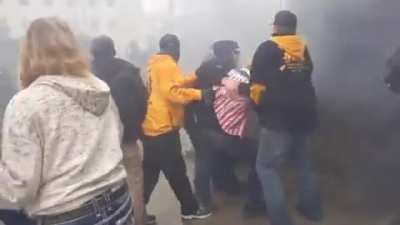 The far right beats the shit out of someone with batons via Laura Jedeed on Twitter