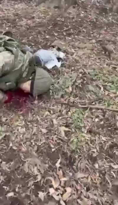 Invaders who came to Ukraine and died for nothing. The last soldier has a grenade in his hand.