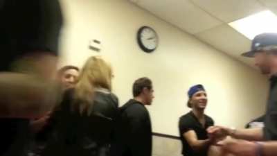 Guy slaps pizza in someone's face and hurled insults at him. Gets knocked out in return