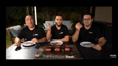 Guga Foods eating a Carolina Reaper steak