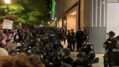 Police in Lexington Kentucky kneel when protestors ask