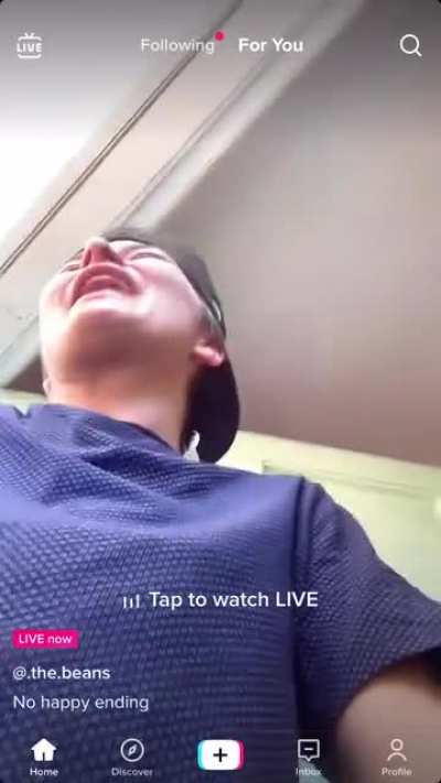 Tiktoker going through breakup pulls gun on live, saved by wellness check officers.
