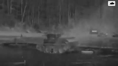Military Tank jumping across a river