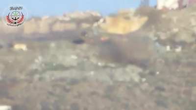 FSA 1st Coastal Division BGM-71 TOW team times their shot with the emergence of an SAA tank to fire, but it appears to be a potential dud - Latakia - 2/5/2015