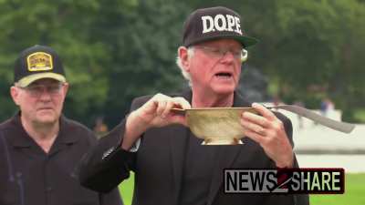 Ben &amp;amp; Jerry's Ice Cream held a "Department of Pentagon Excess" or "DOPE" protest in front of the US Capitol, describing examples of wasteful military spending before taking a fucking chainsaw to a model of the Pentagon filled with prop dollar bills.