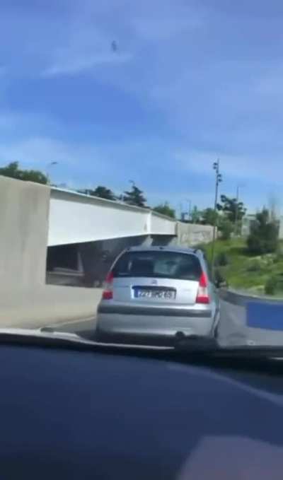 Girl on whippets driving erratically on the road ends up smashing her car on the road.