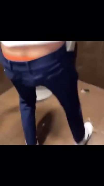Peeing on the floor in a public bathroom