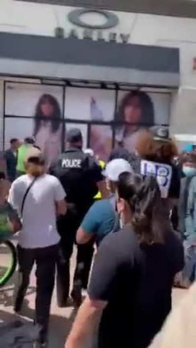 Man with swastika tattoo arrested at White Lives Matter rally for attacking an Asian man