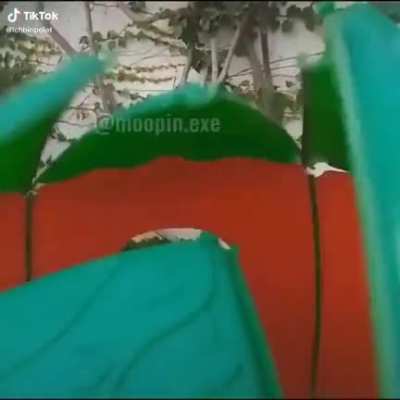 AE...