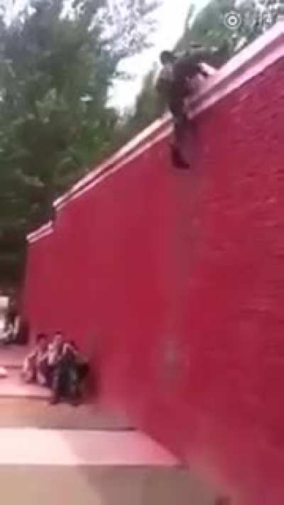 Team high wall climbing at breakneck speed