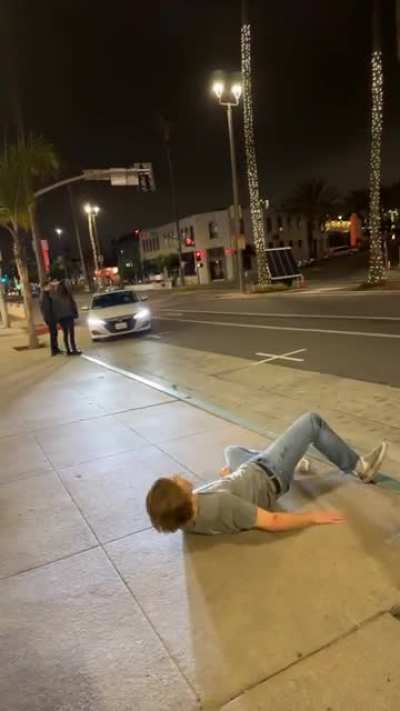 Friend tries doing front flip off wall after getting hammered