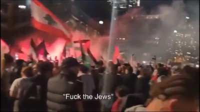 A crowd at the steps of the Sydney Opera House chant "gas the Jews"