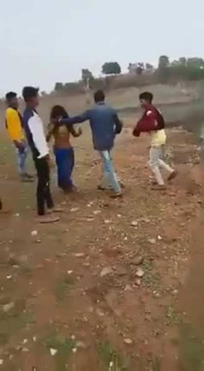 Indian man brutally beats a woman for talking to a boy