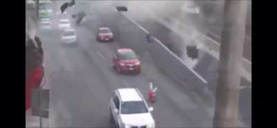 Guy in Mexico get flung from his car after jumping the median.