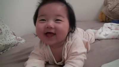"Wow it's mommy! But I'm sleepy :D"